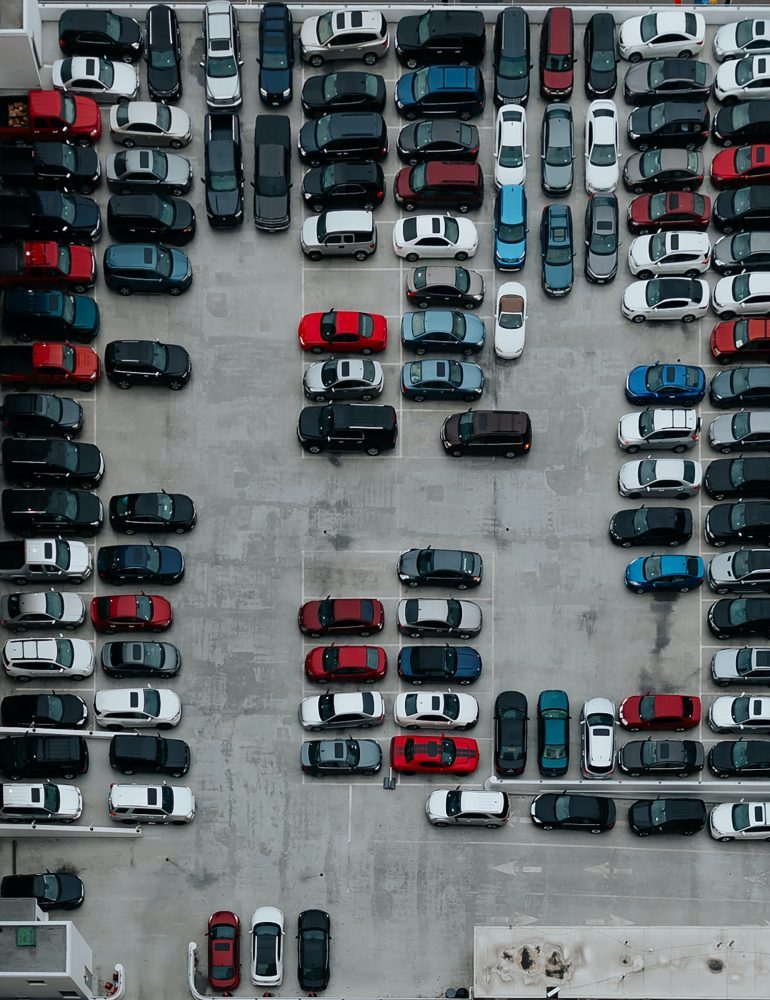 aerial photography of cars on parking lot